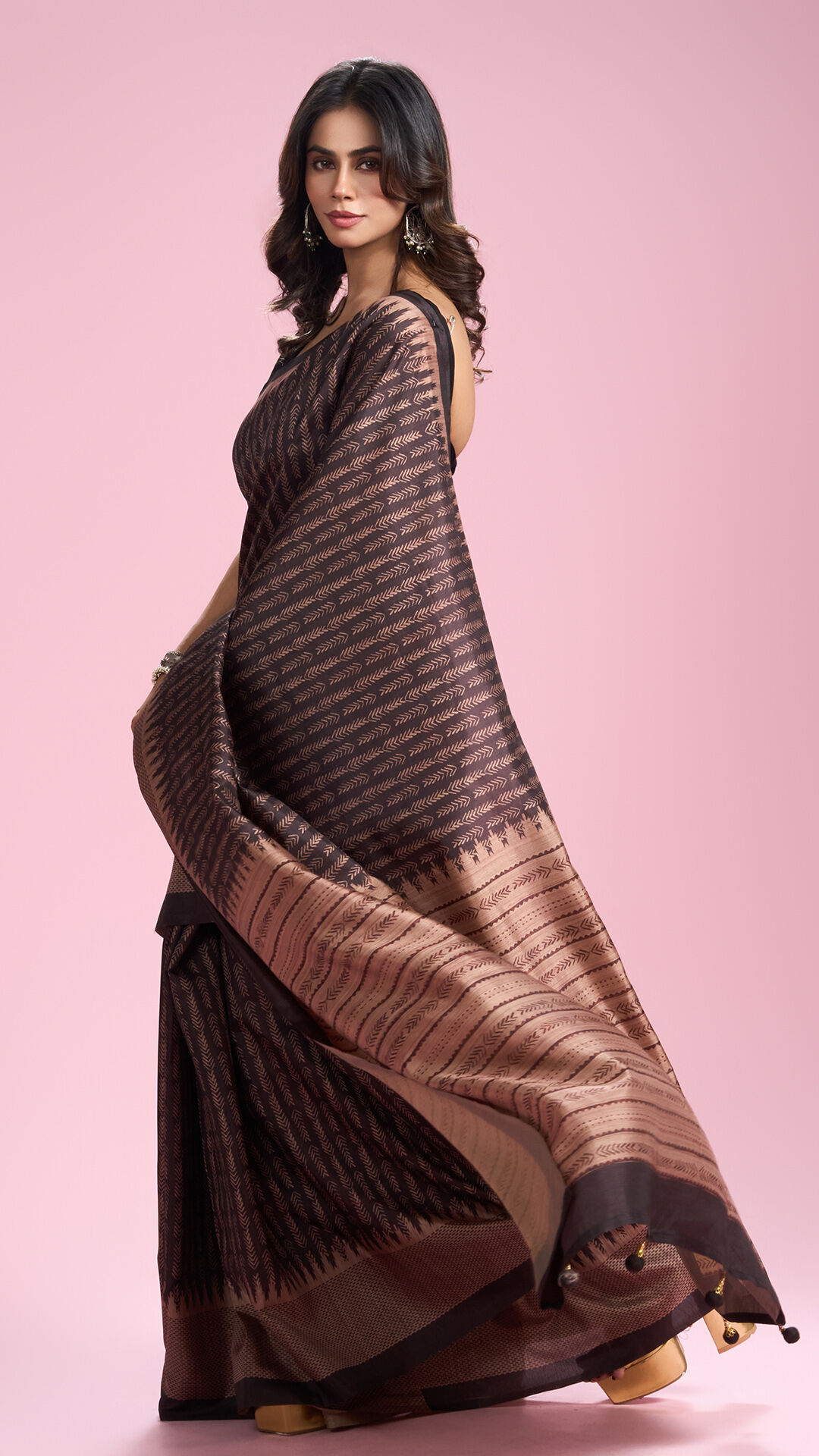 Woman wearing Kohl Black Jaal Patterned Stone Embellished Saree